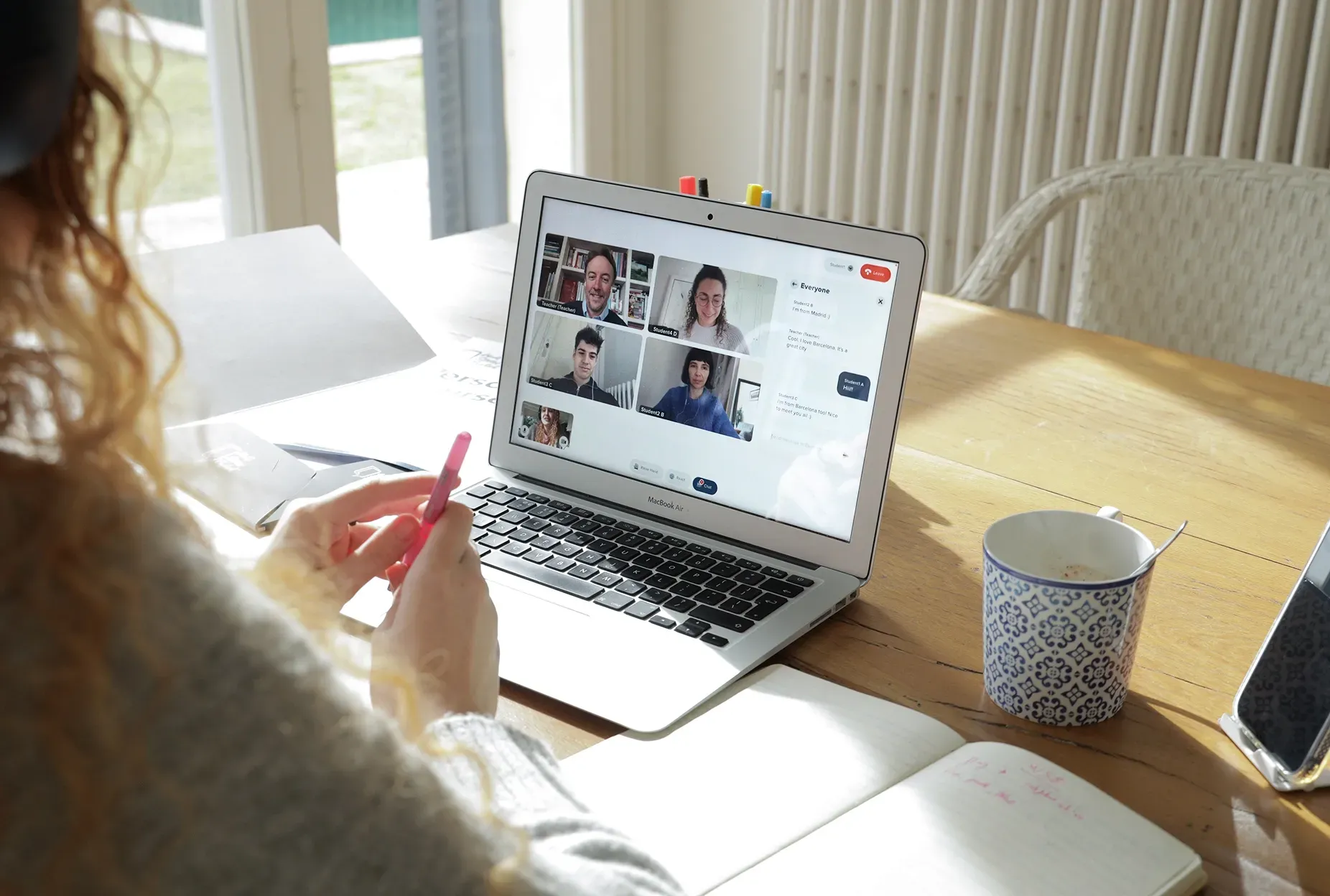 Student attending an online English coaching session from home